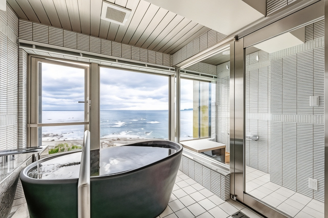 Indoor bath with a sea view.