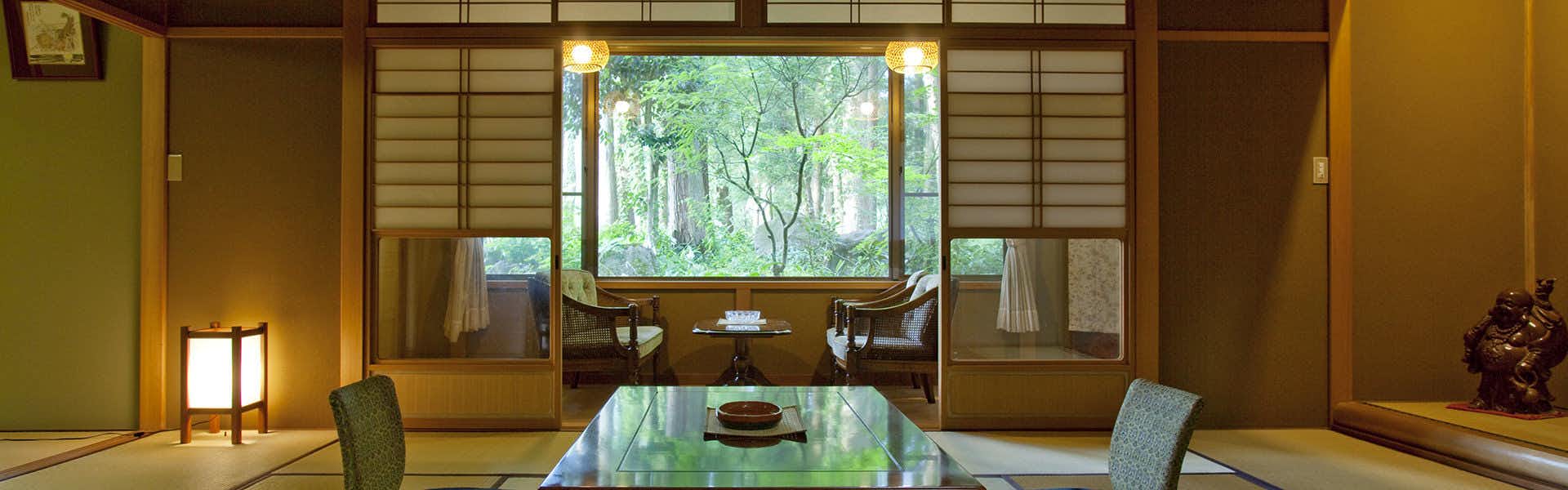 Ichirino Kogen Hotel Roan with a traditional tatami room with a garden-facing window.
