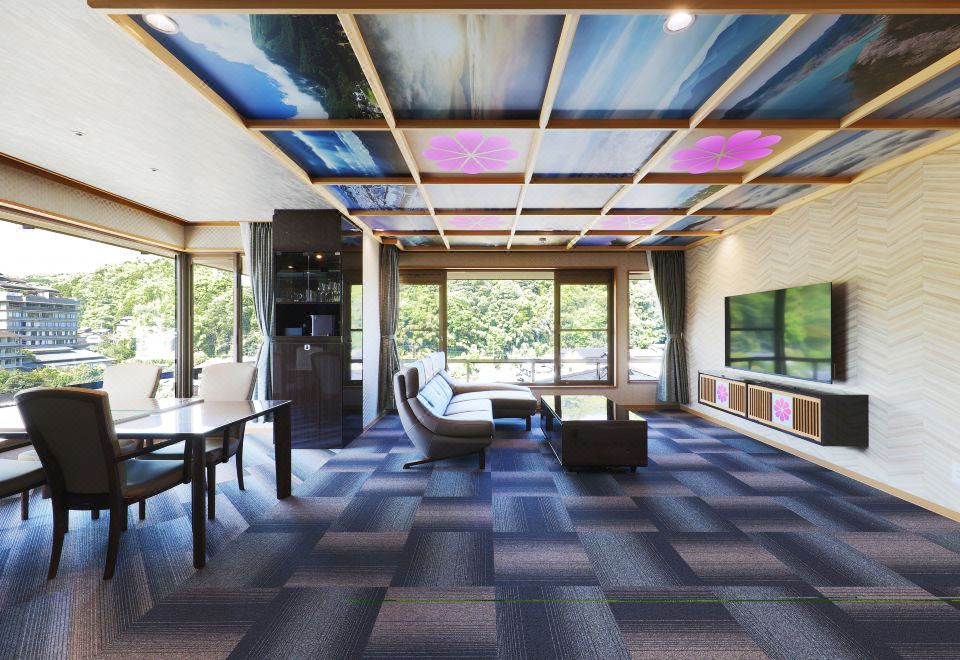 A spacious sitting area beneath a colorful illustrated ceiling.