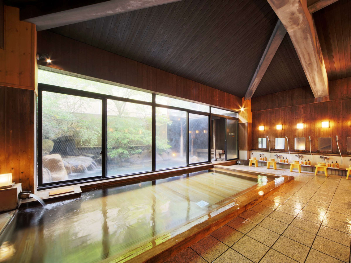 Indoor bath with broad windows.