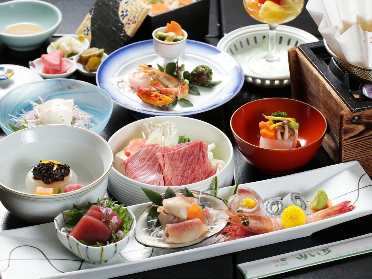 Morioka Tsunagi Onsen Tabizomeya Yamaichi with a kaiseki meal with sashimi and small plates.