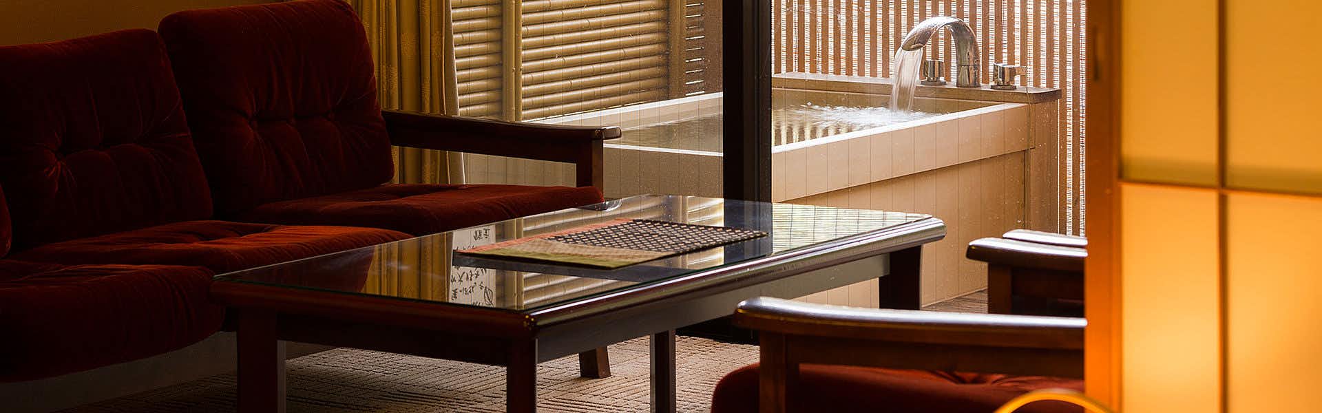Mori no Sumika Resort & Spa with a private lounge beside a square soaking bath.