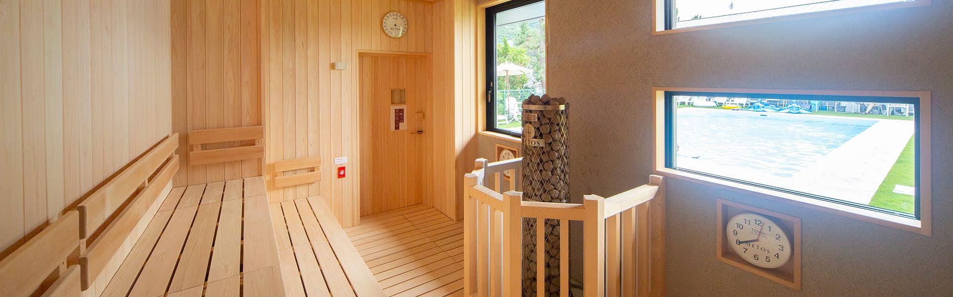 Awaji International Hotel The Sunplaza with a pale timber sauna overlooking the coastline.