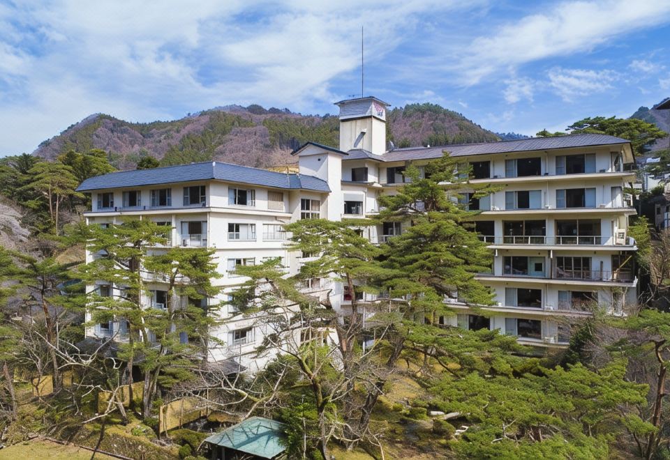 Traditional building among trees.