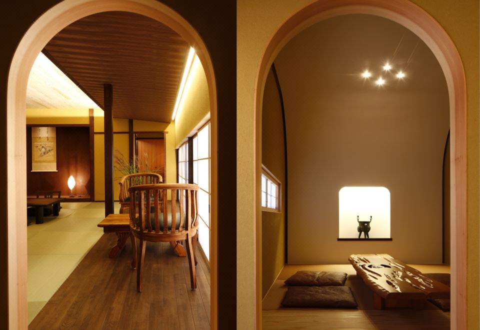 A wood-lined corridor with an arched doorway.