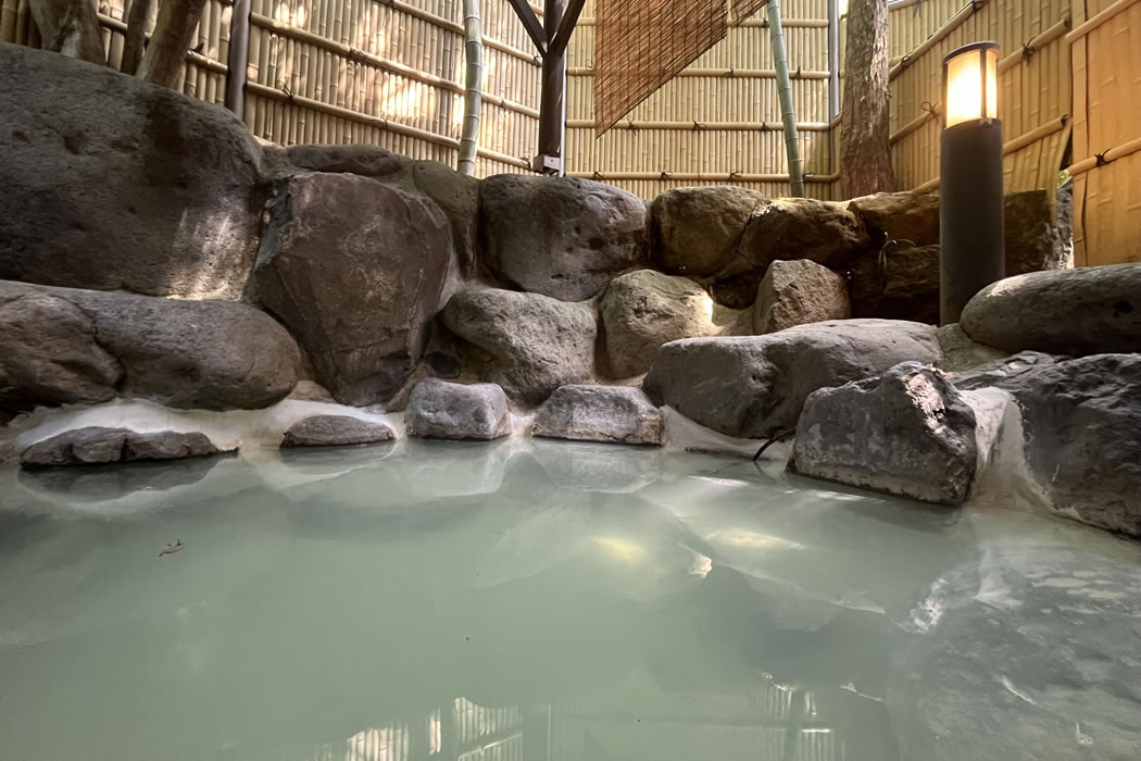 Rock-lined communal bath.
