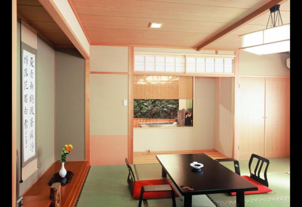 Japanese-style room with a low table and alcove.