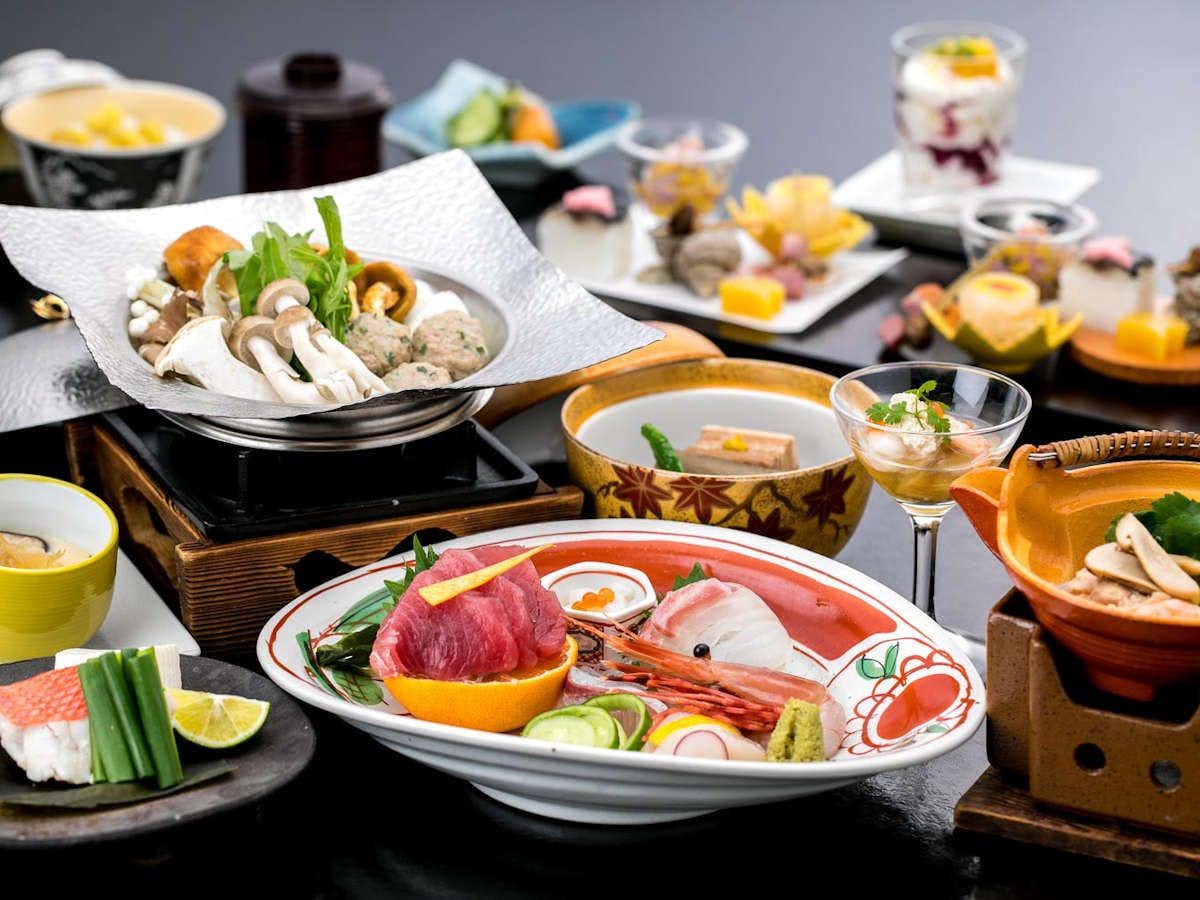 Ryokan Tachibana with a Japanese dinner arranged around sashimi and seasonal dishes.