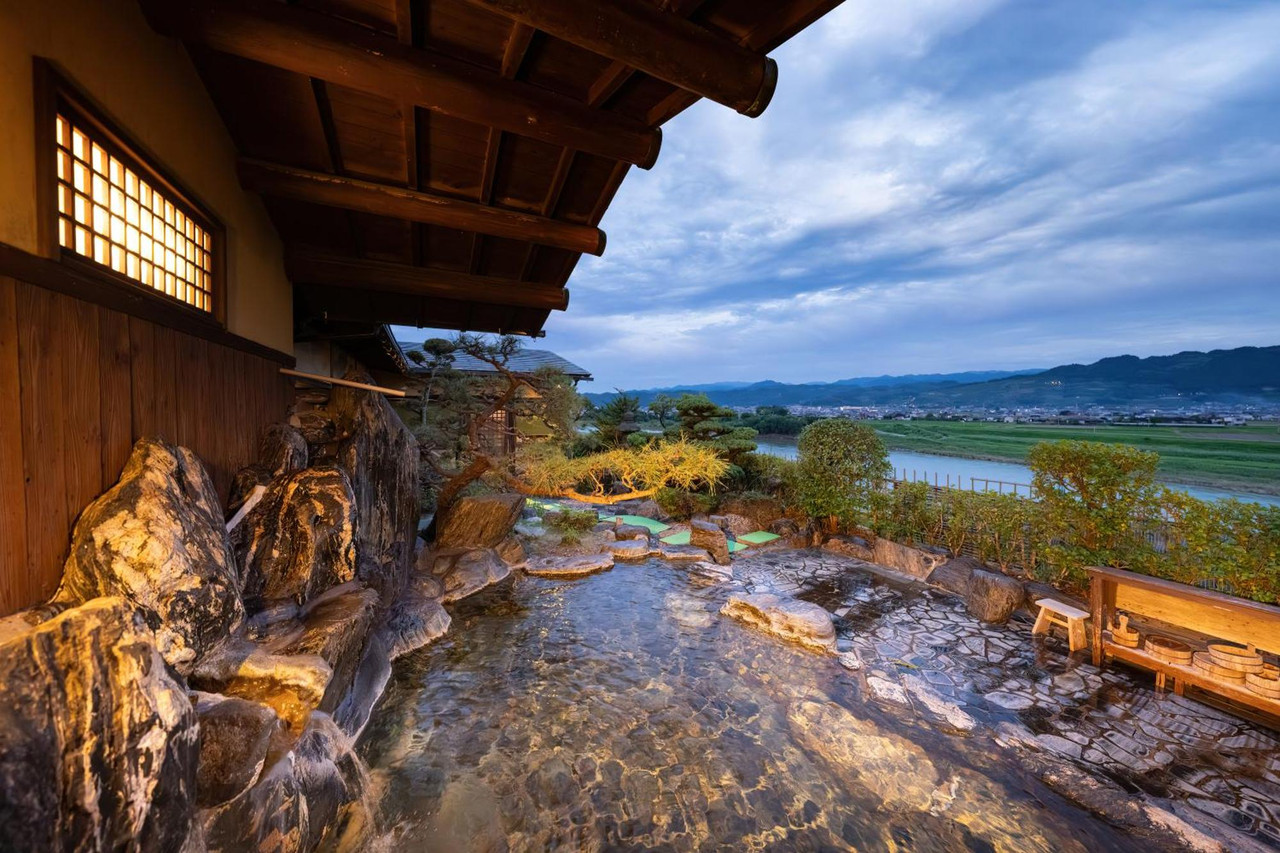 Open-air bath overlooking the grounds.