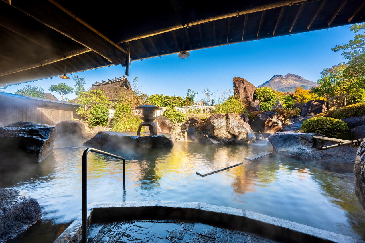 Open-air bath with a mountain view.