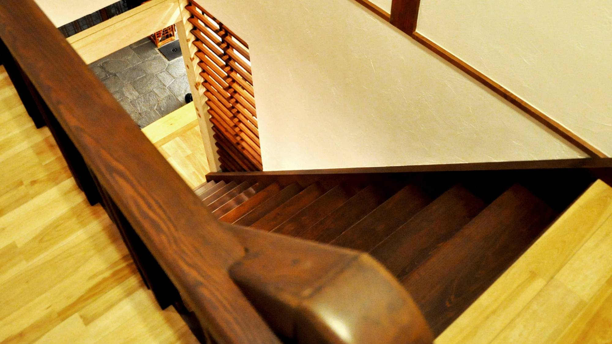 Tatami room with a low dining table and shoji screens.
