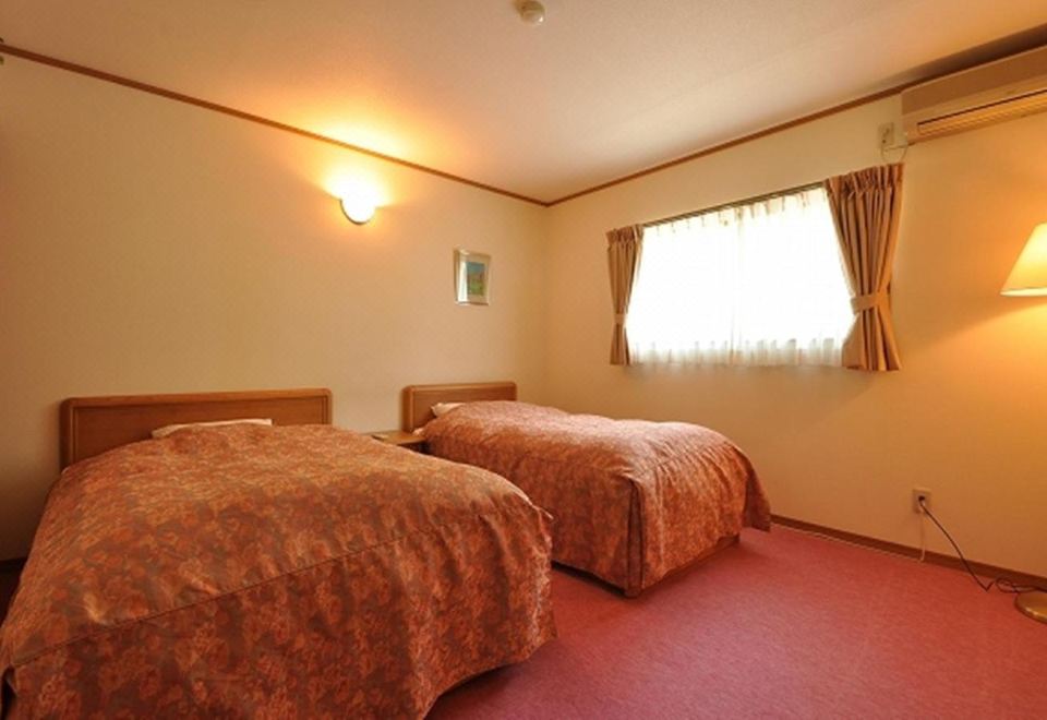 Twin room with beds.