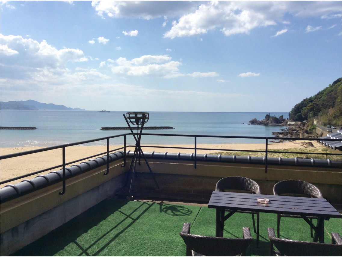 Balcony overlooking the water.