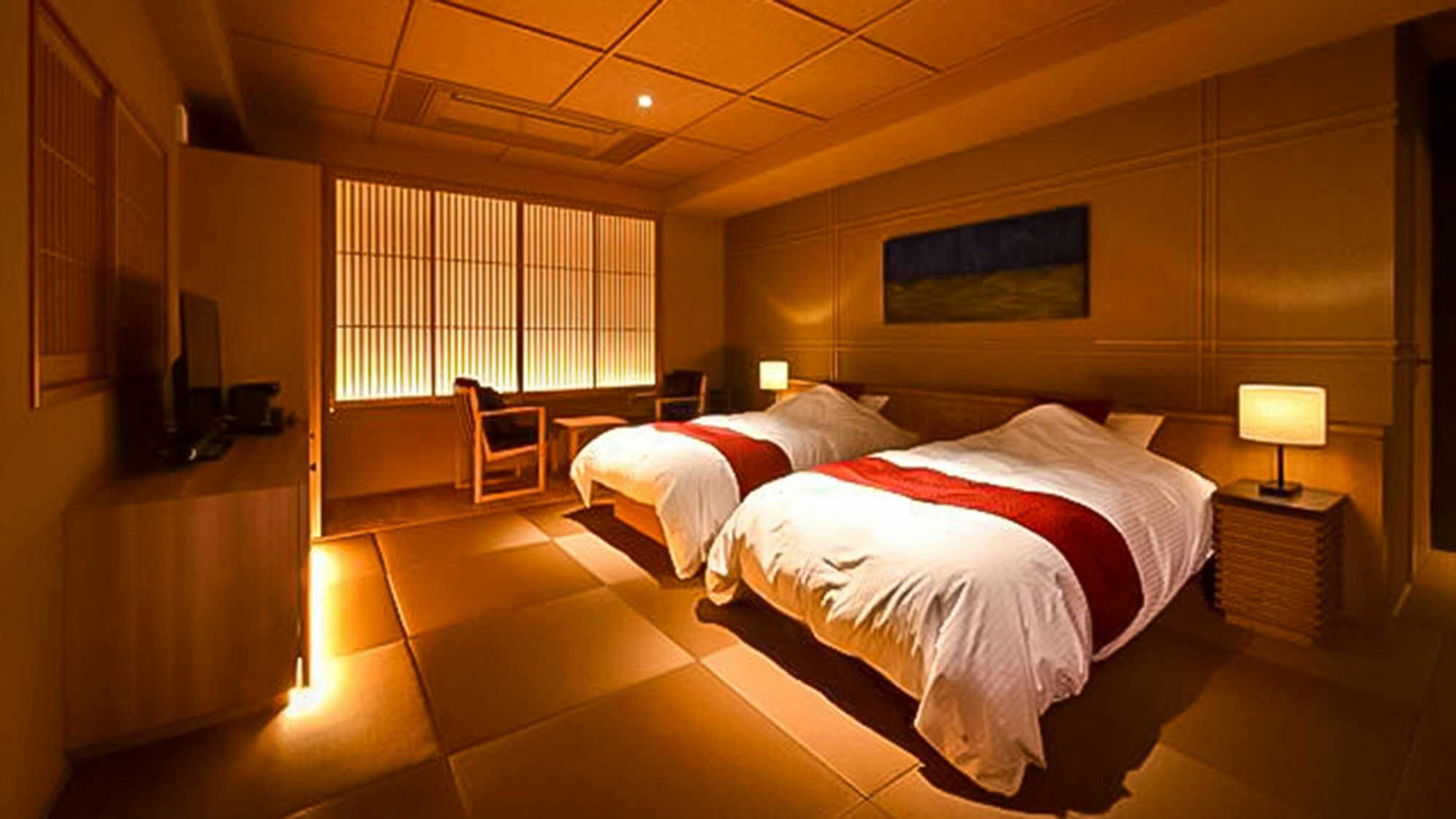 Maruha Bettei Hazu no Hoshi with this scene, where two white beds with red throws sit beneath a wood-paneled ceiling.