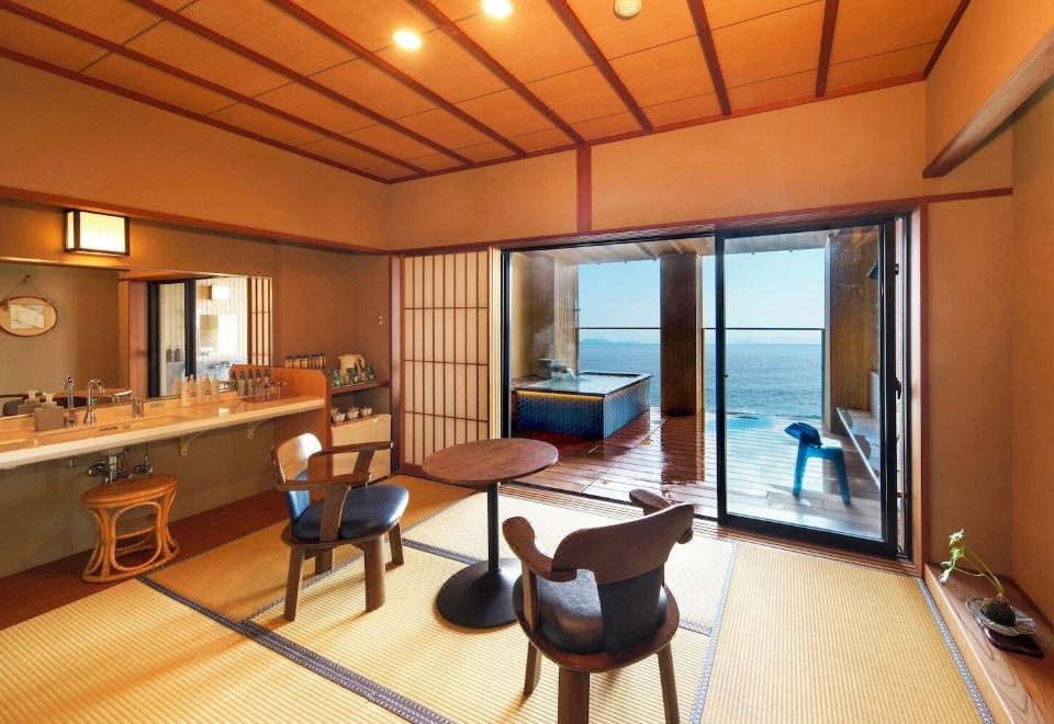 Tatami room with a low table and ocean view.
