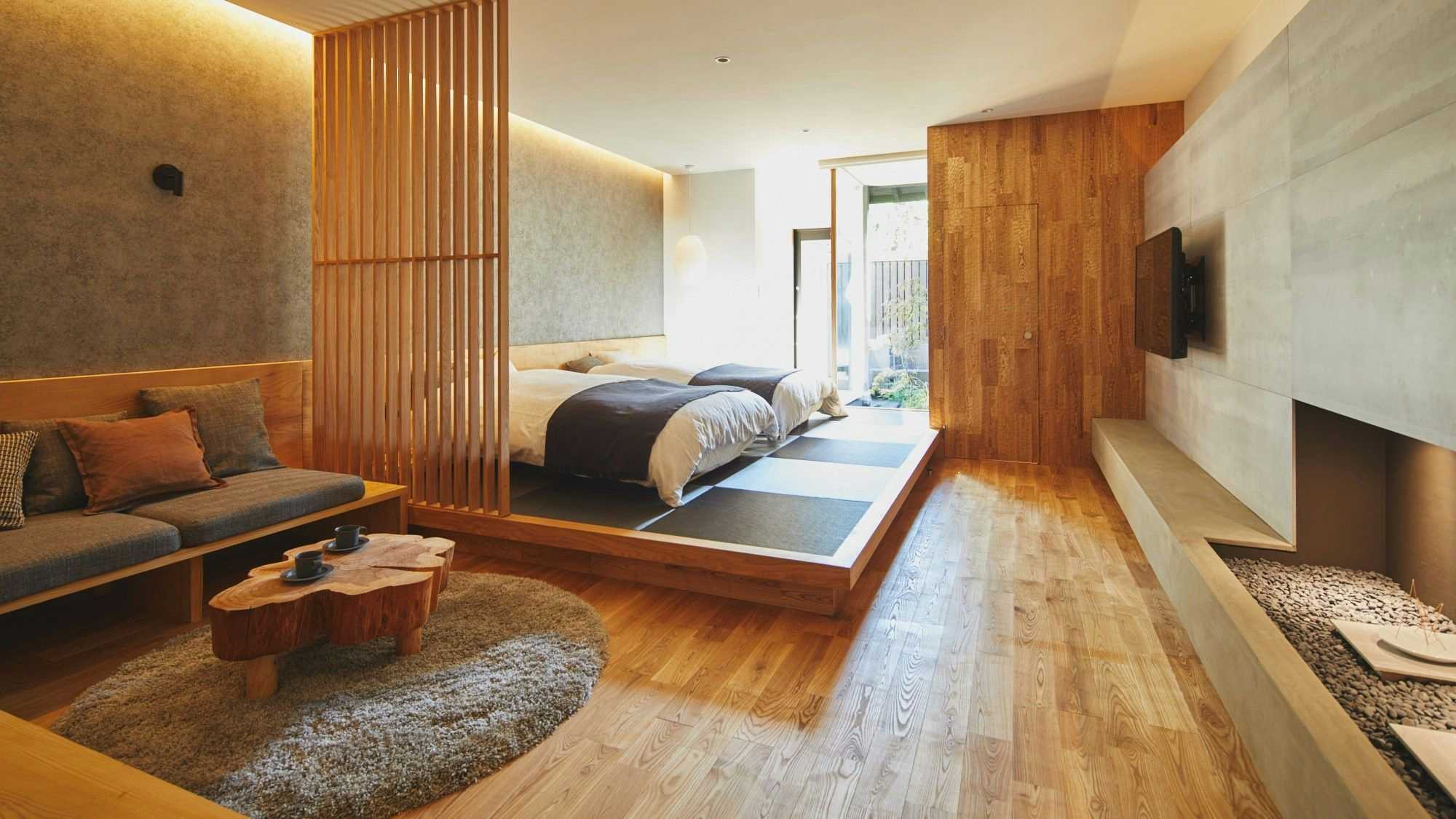 Nanaougi with a modern suite with timber flooring and twin beds.