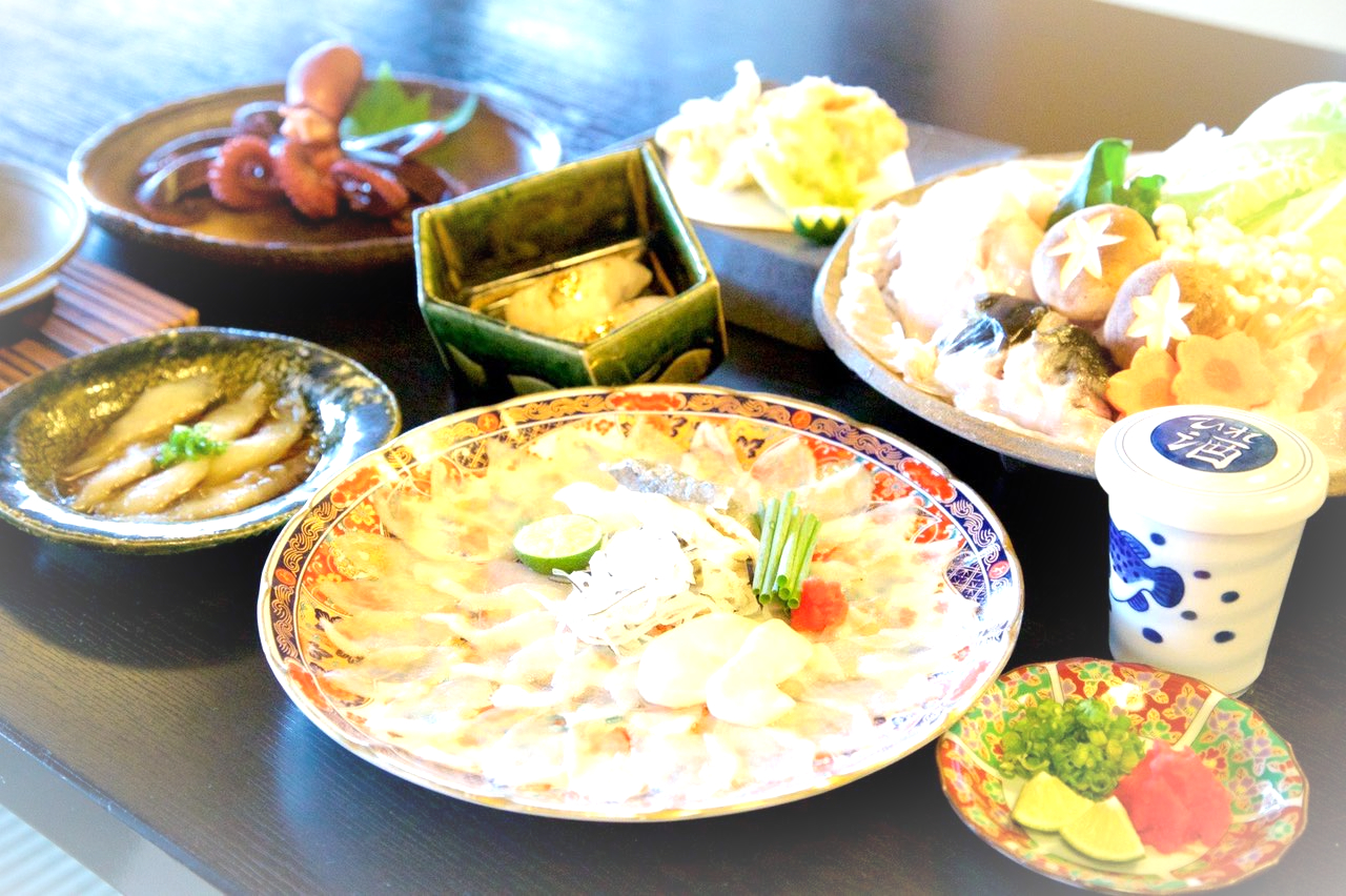 A colorful Japanese meal of seafood and small dishes.