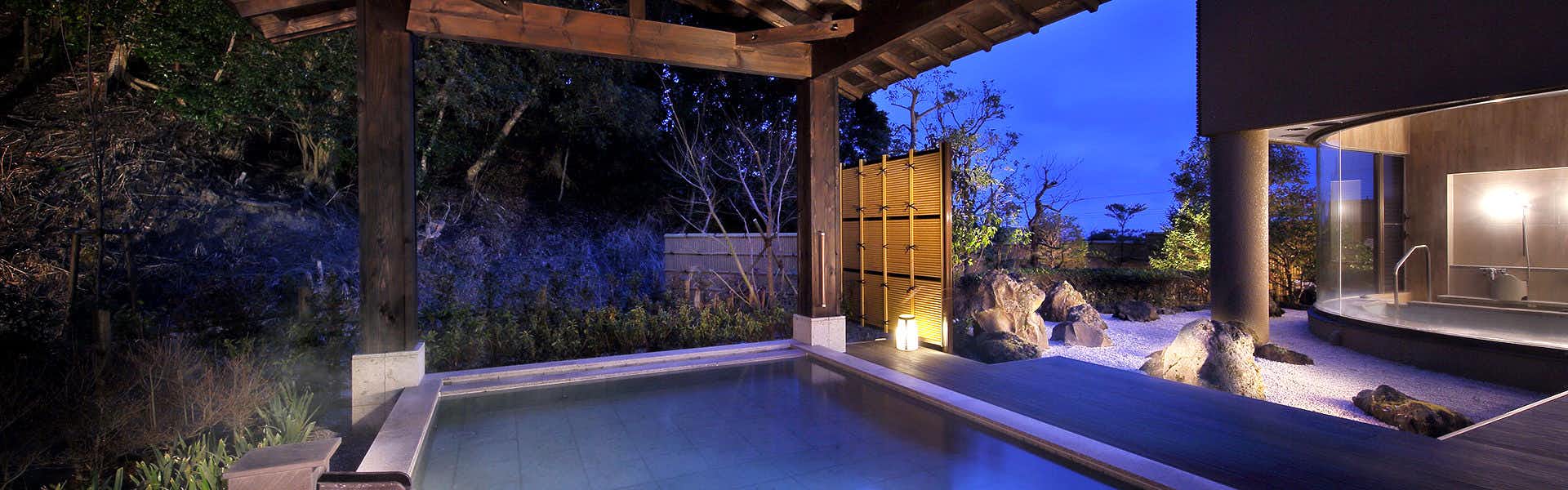 Minamiboso Katsuura Suika with a private outdoor bath beneath a timber garden shelter.