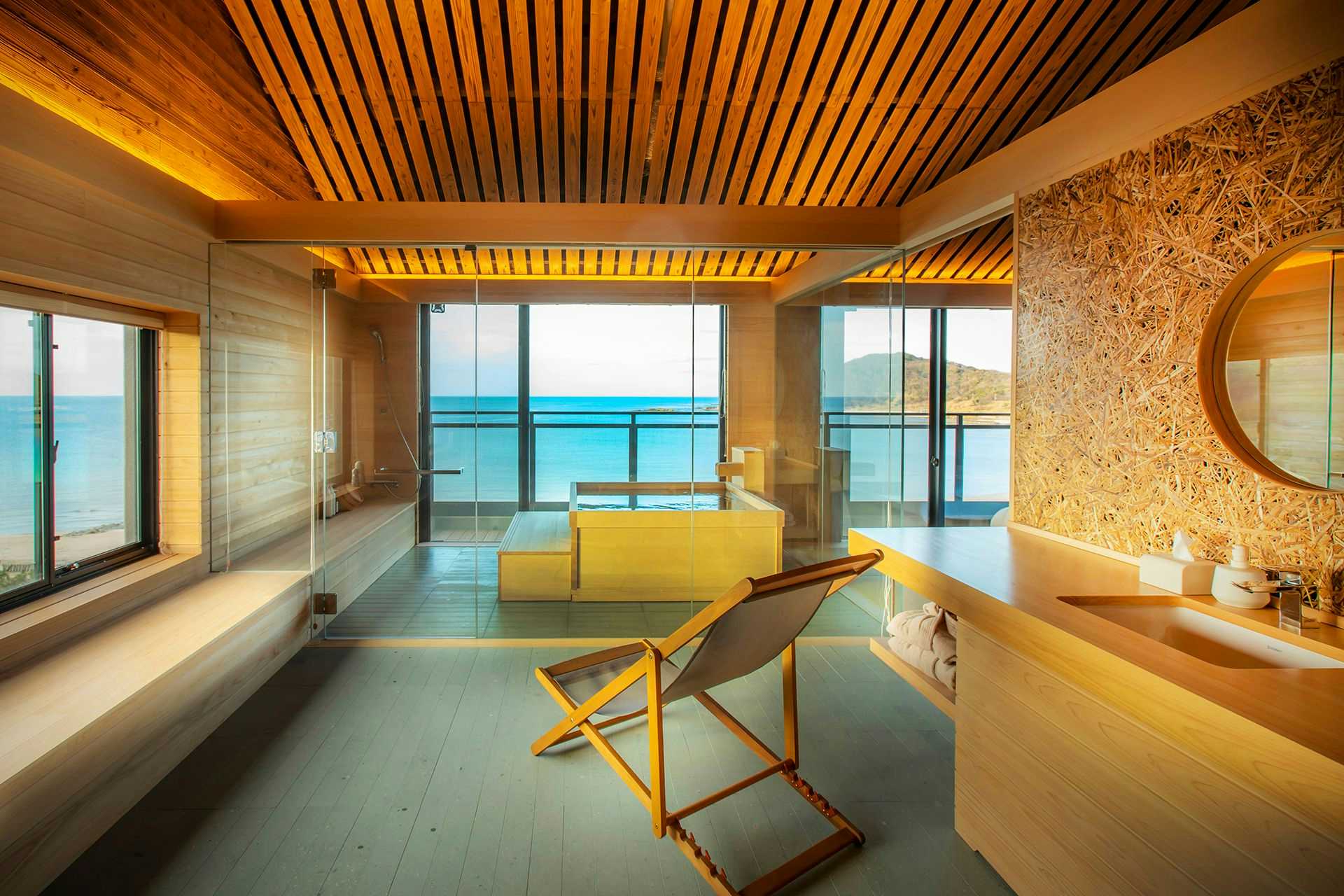 Seaside Satake with a timber suite with ocean windows and a private soaking bath.