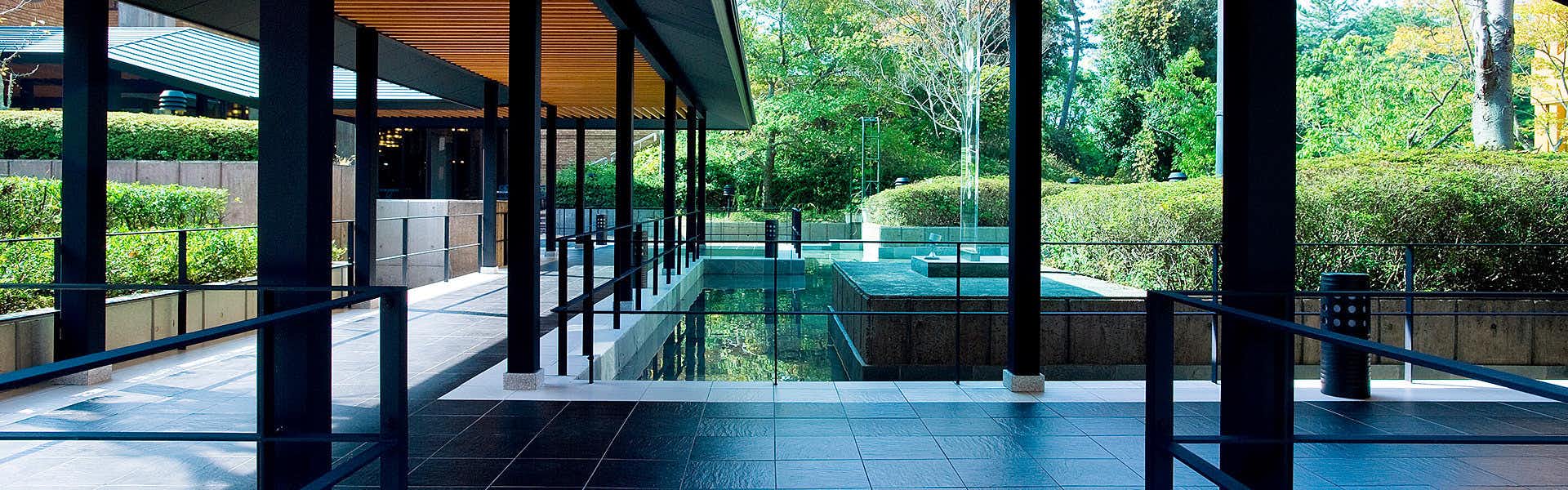 Saio-no-Miya: A Dream Inn of Imperial Romance Nestled in Ise with an indoor pool enclosed by floor-to-ceiling garden windows.