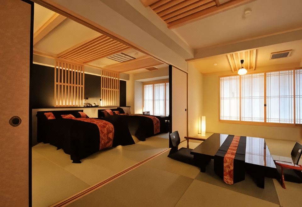 A Japanese guest room with twin beds.