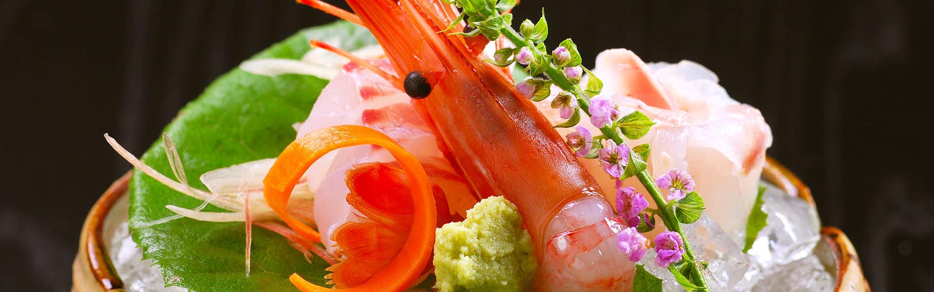 Murakamikan Yuden with fresh shrimp sashimi served with green wasabi.