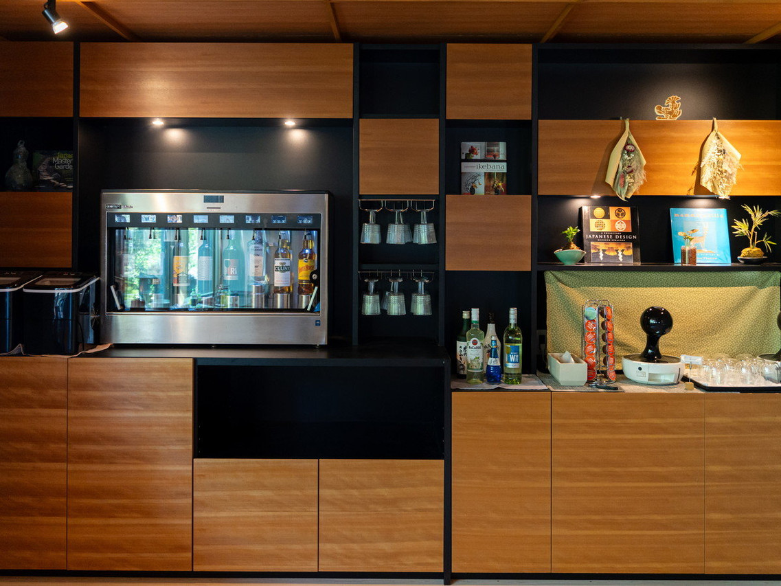 Interior display cabinet with bottles and ornaments.