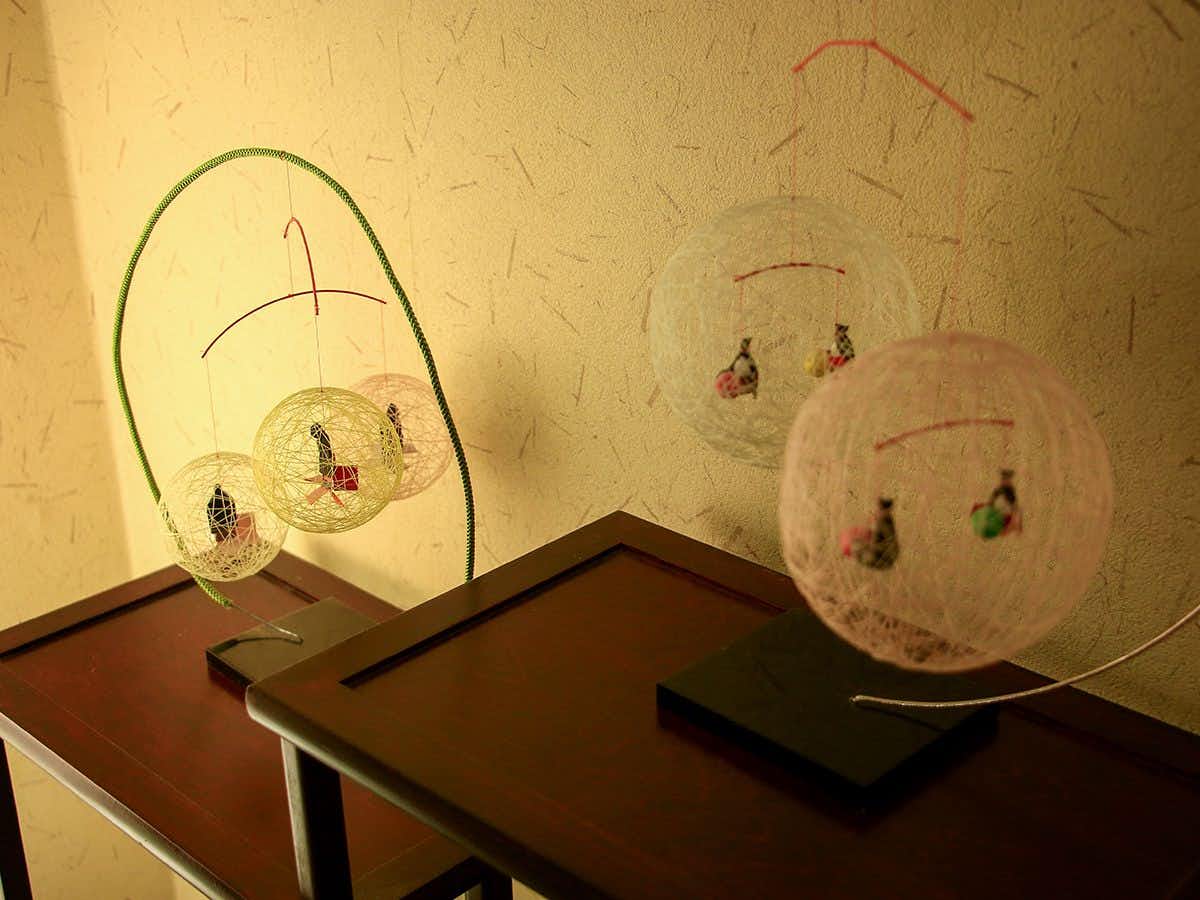 Onyado Ichifuji with delicate glass ornaments displayed beneath warm lighting.