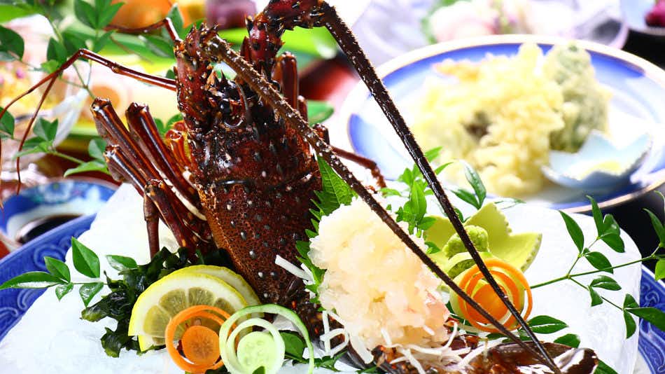 Obama Onsen Fukutokuya Ryokan with fresh spiny lobster sashimi presented with citrus.