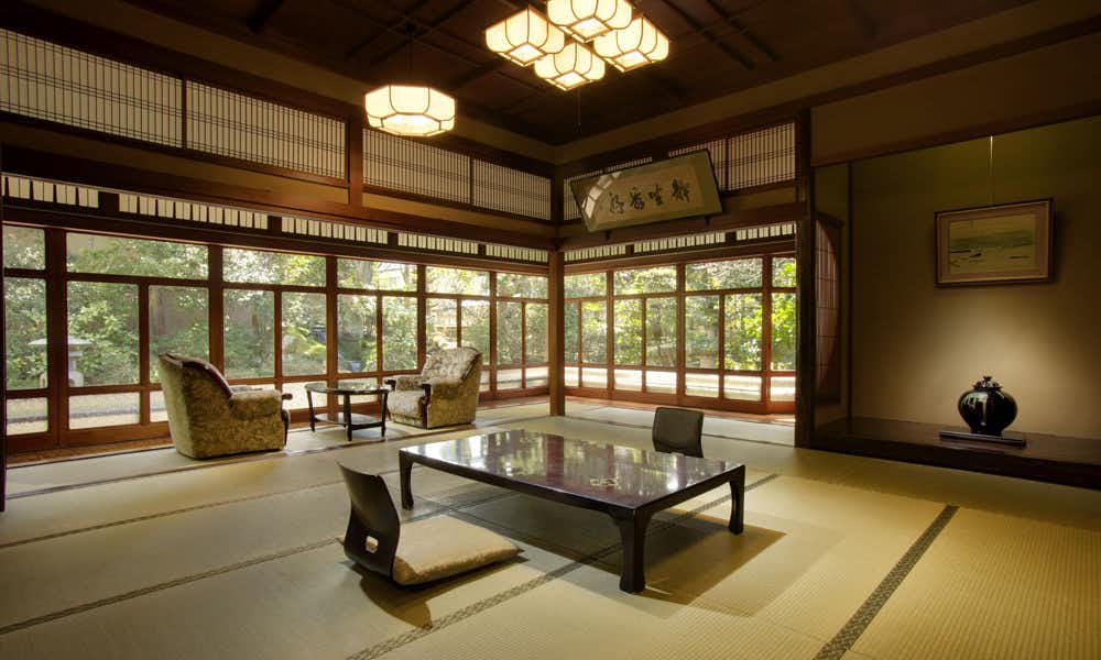 Hoshokan with a sunlit tatami lounge overlooking the garden.