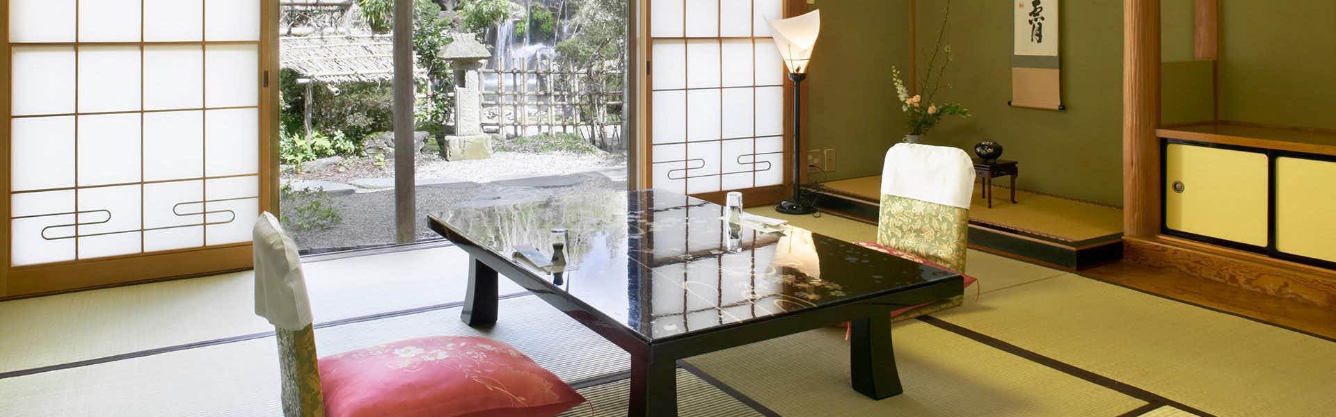 Echigo no Oyado Wakatake with a traditional tatami room with low table and garden-facing window.