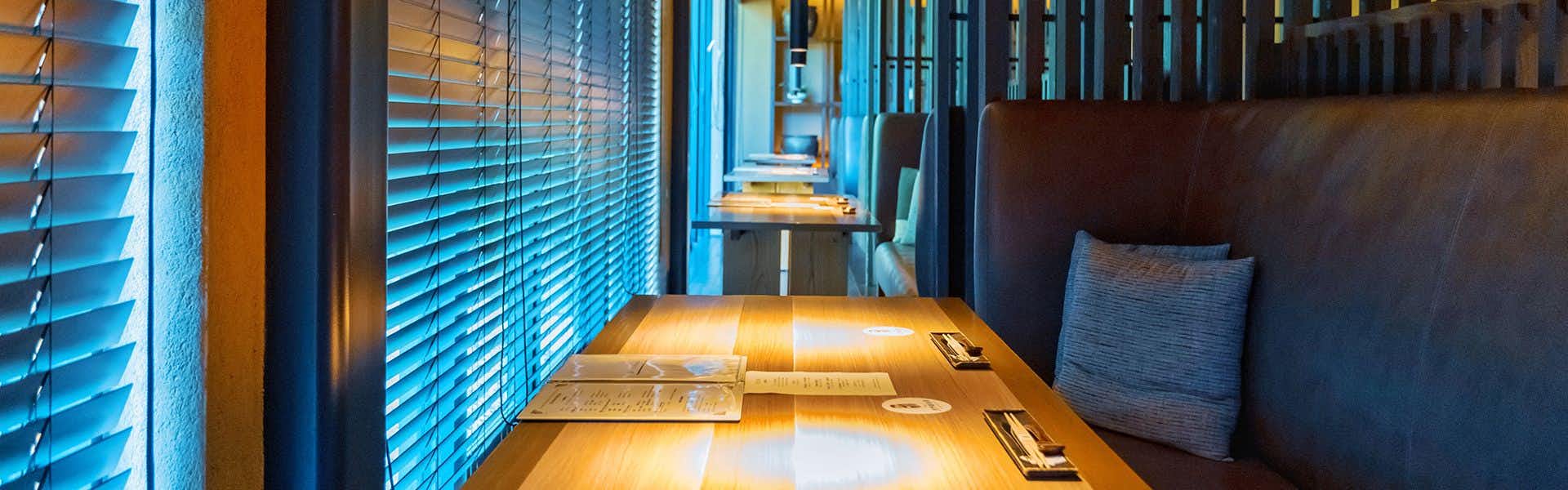 World Heritage Resort Kumano Club with a private dining counter lined with blue window blinds.