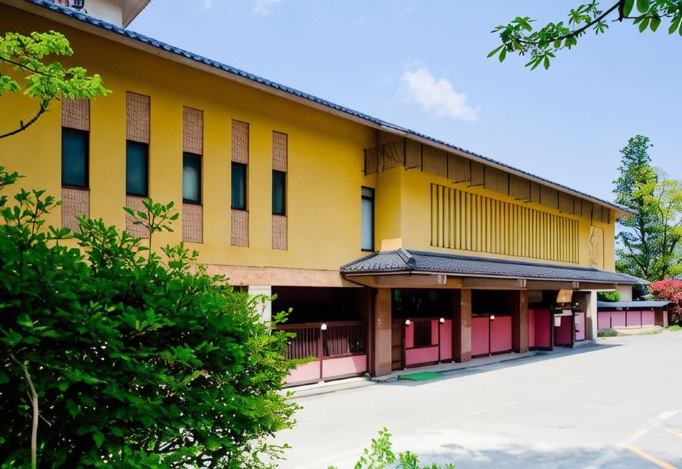 A long traditional hotel building.