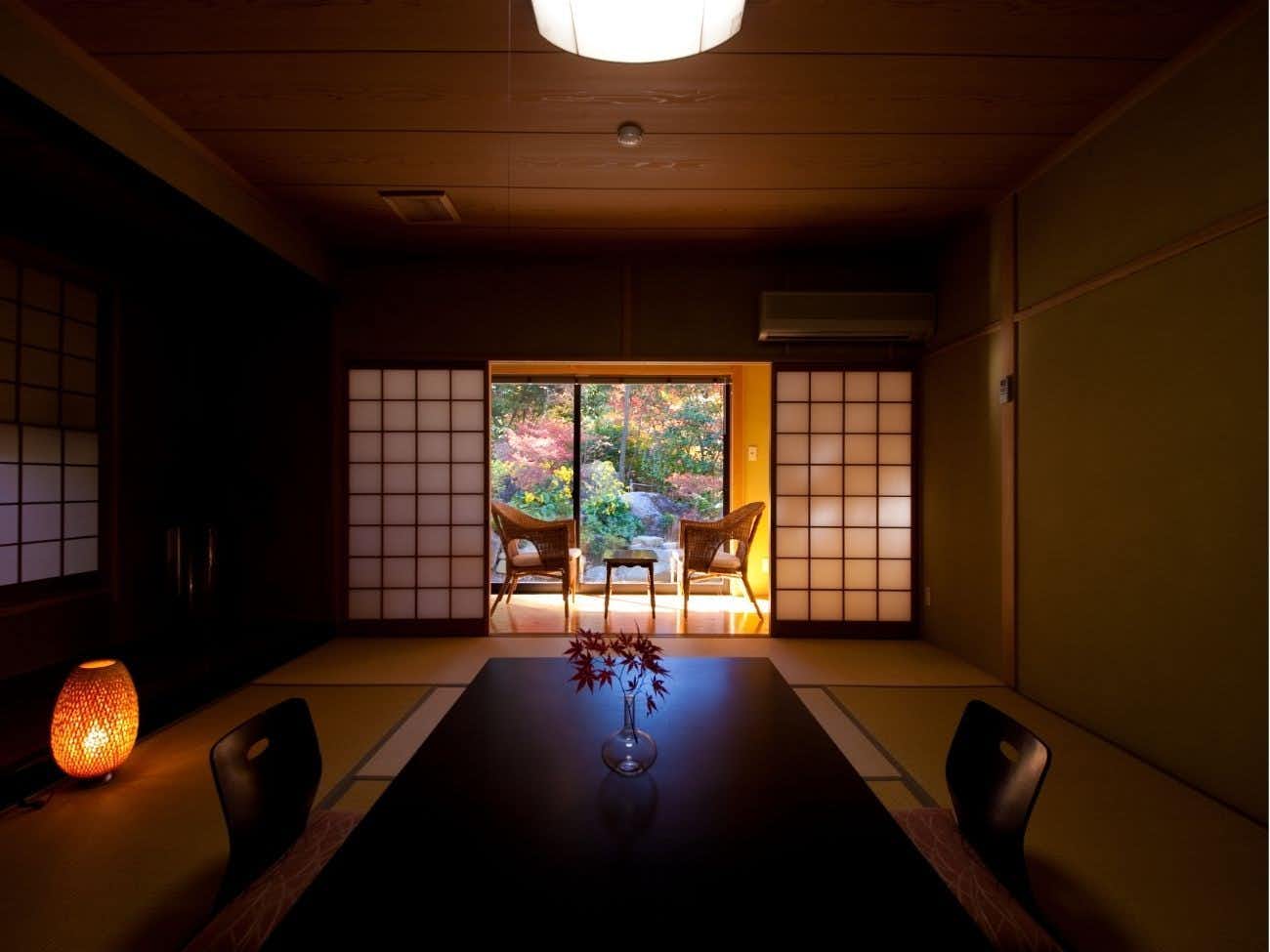 Kogane Onsen Kogane Sanso with a private tatami dining room opening toward the garden.
