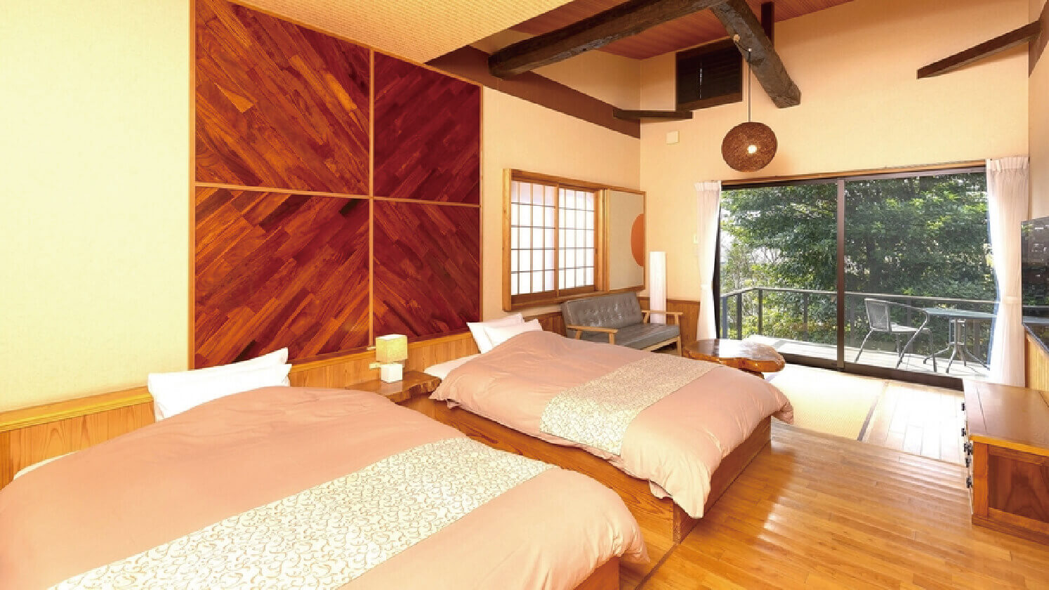 A light-filled twin bedroom and leafy outlook.