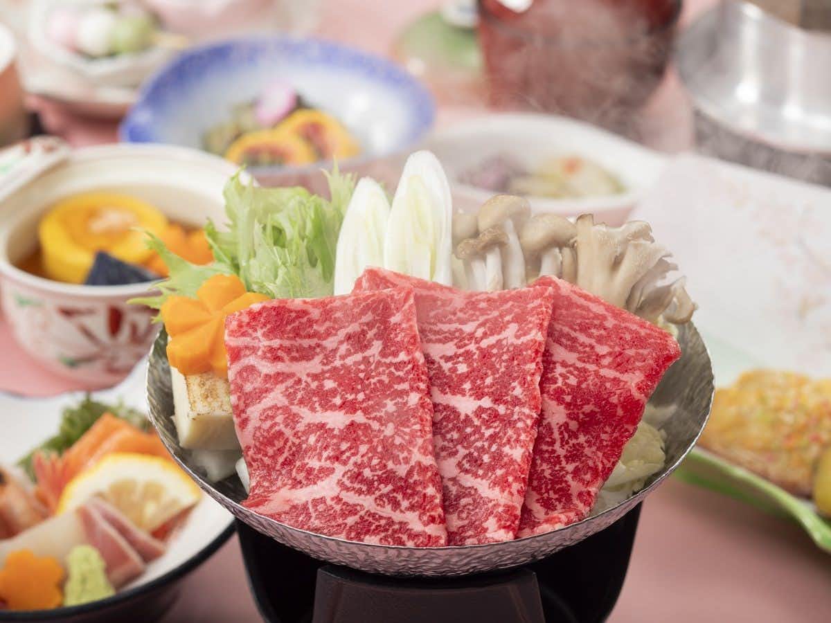 Hotel Yumoto Noboribetsu with marbled beef arranged with mushrooms and vegetables for tabletop cooking.