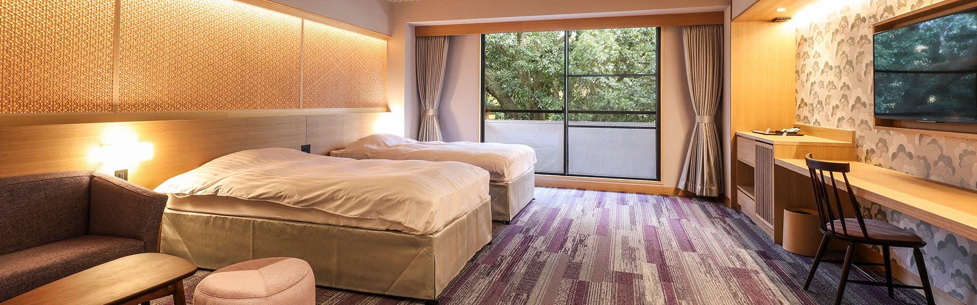 SPA TERRACE Shisui with a contemporary bedroom with pale sofa and private terrace.