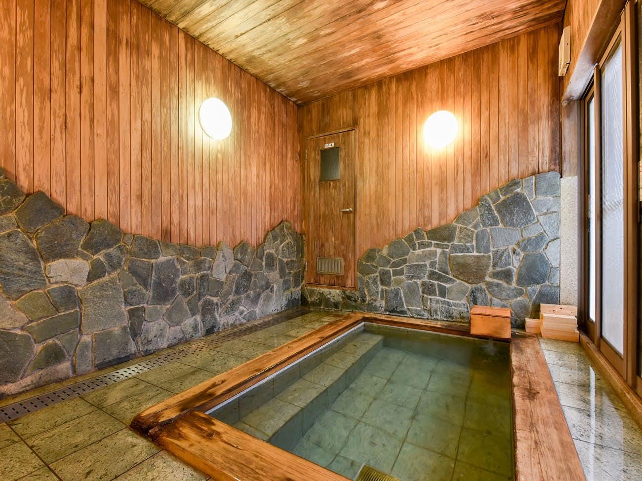 A timber indoor bath.