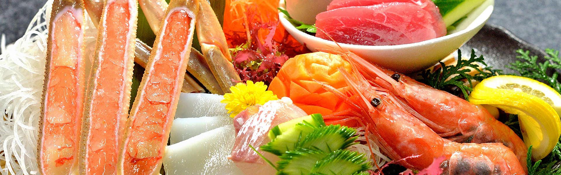 Kaishu with a generous crab platter with shrimp, sashimi, and vegetables.