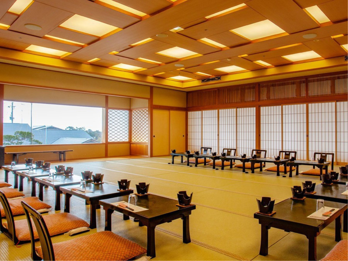 A dining hall with tables.