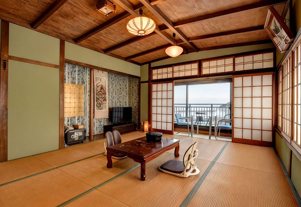 A Japanese guest room opening to a balcony.