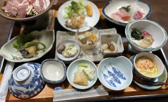 A Japanese meal arranged in multiple dishes.
