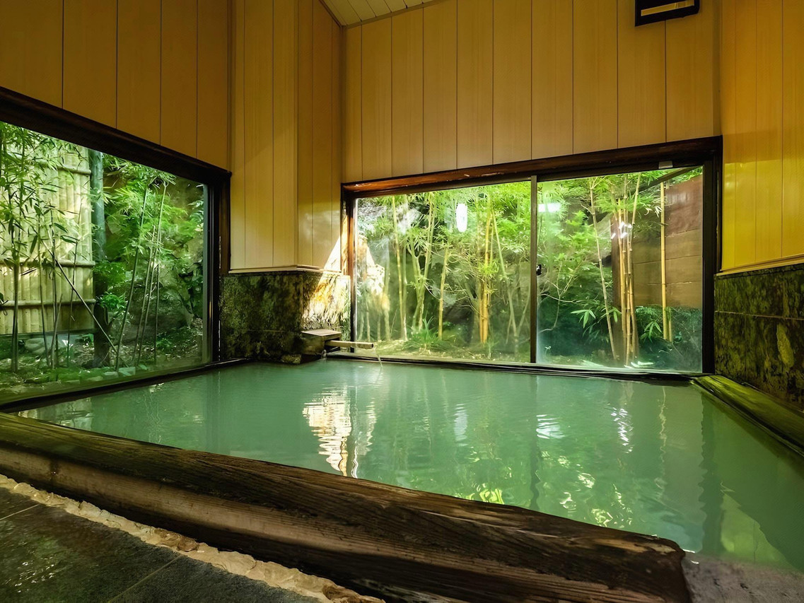 Indoor bath with a broad window.