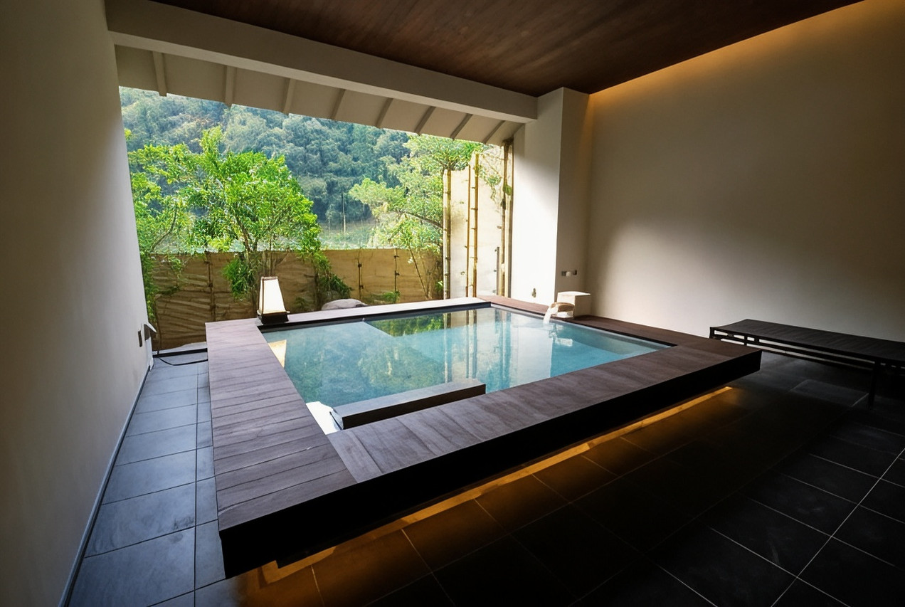 A private pool sits beneath a covered terrace.