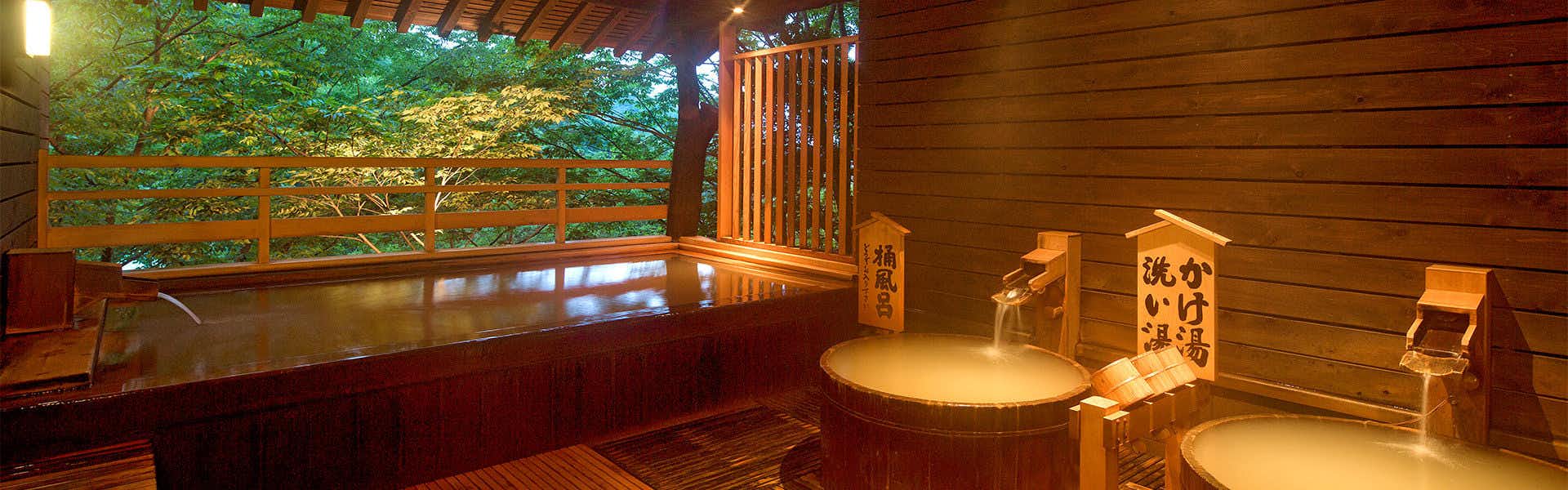 Kishigon Ryokan ~ Adjacent to Stone Steps Street, Rare Hot Spring "Golden Water" Inn ~ with two private baths against timber walls.