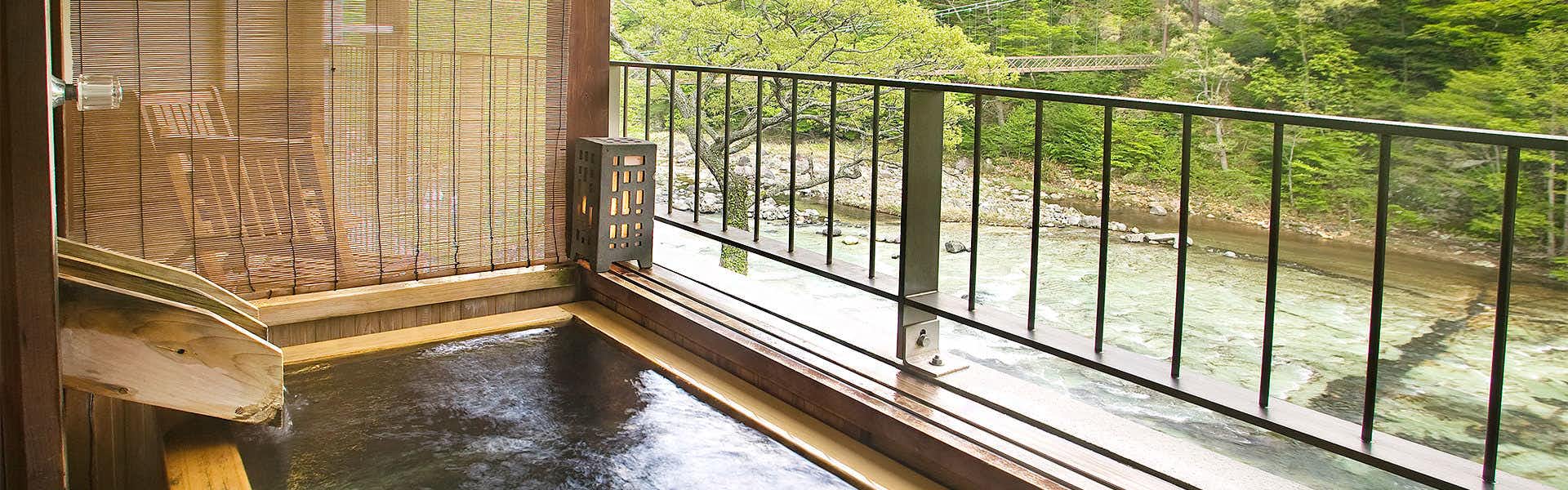 Shiobara Onsen Hito-Toki-Omoi wo Tsumugu Yado Ayatsumugi with a private balcony bath overlooking a green river gorge.