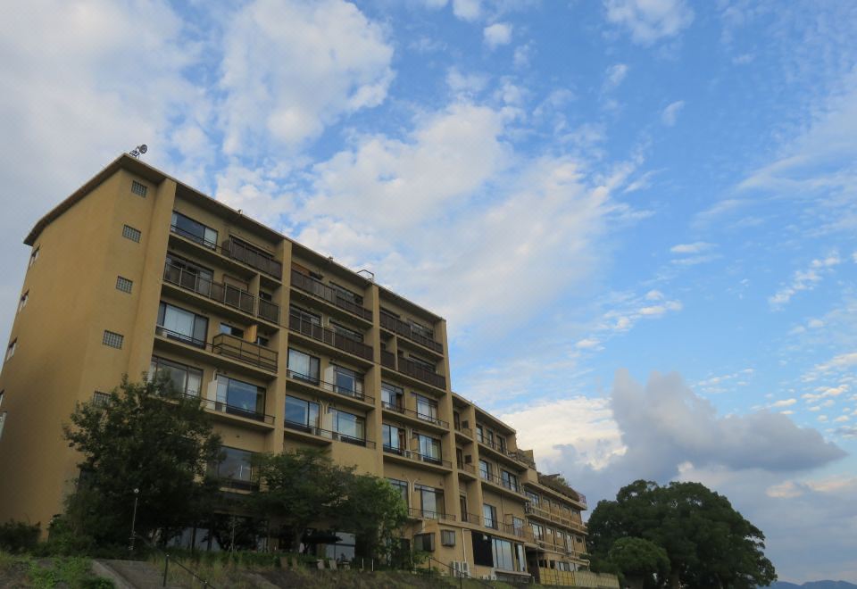 Property exterior beside a landscaped garden.