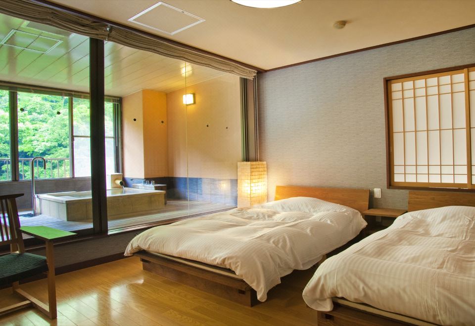 A Japanese room with twin beds.