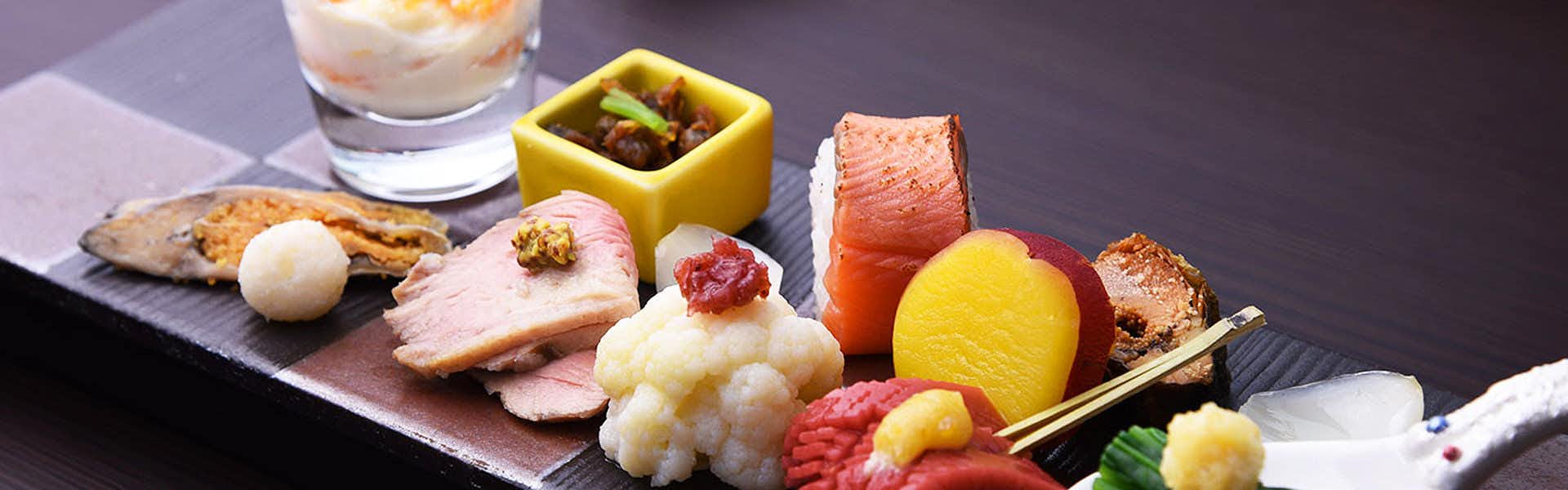 Kihiro: A Retreat for Two in the Skies of Hubei with seasonal appetizers arranged across a dark rectangular plate.