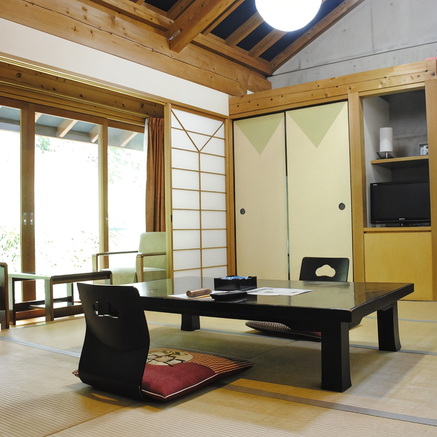 A quiet room combines tatami seating and garden views.